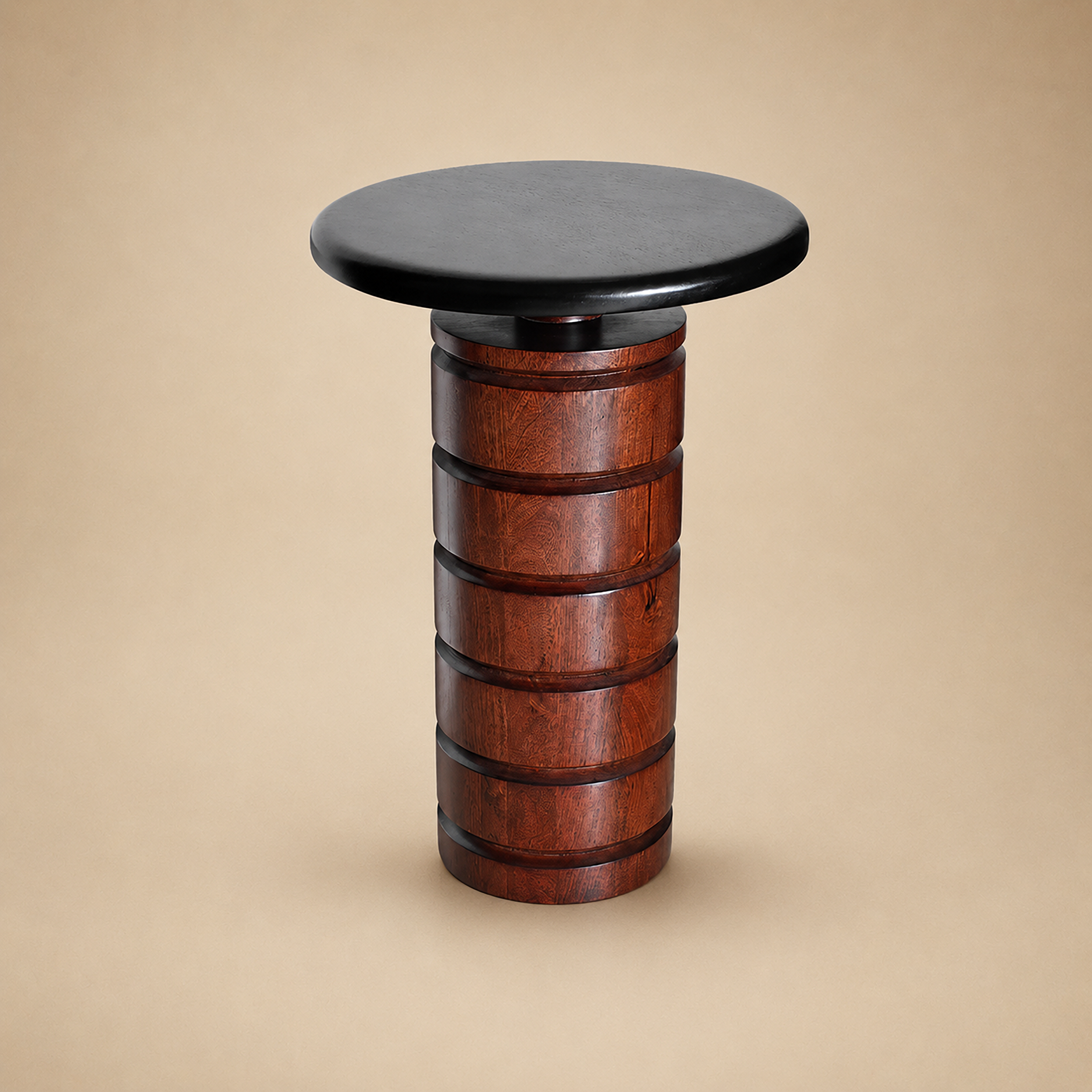 Nem end table with a ribbed cylindrical wood column and round black top, on a neutral backdrop