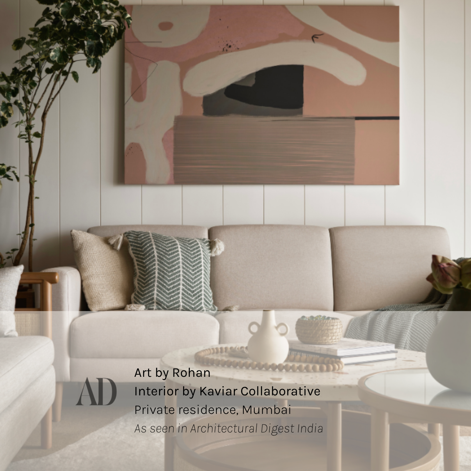 Large abstract TonalityONE artwork by Rohan in pink and taupe tones, above a sofa in a Mumbai living room, seen in a project by Kaviar Collaborative featured in Architectural Digest India